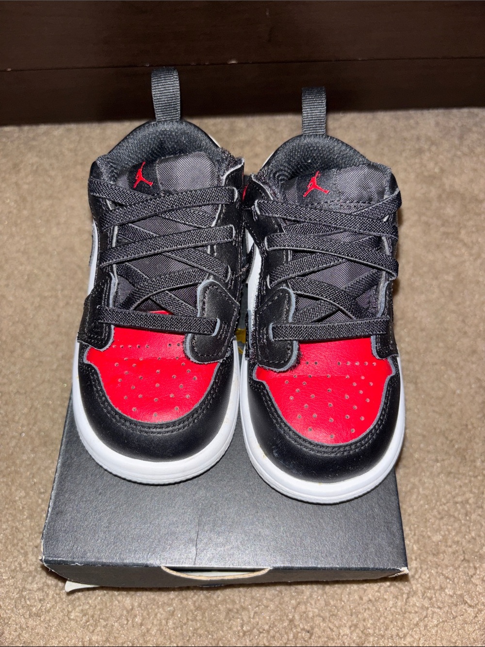 Jordan 1 Kids' Black and Red Low Top Sneakers size 7. White, Black & Red